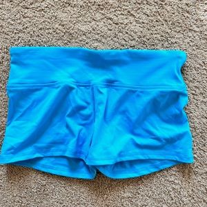 Tropical blue spandex, nike brand, size small, never worn